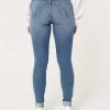 Curvy High-Rise Ripped Medium Wash Super Skinny Jeans