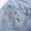 High-Rise Medium Wash Shell Embroidered Baggy Denim Shorts 5″