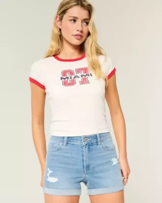 High-Rise Ripped Medium Light Wash Denim Shortie Shorts