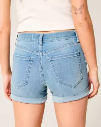 High-Rise Ripped Medium Light Wash Denim Shortie Shorts