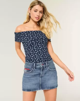 Low-Rise Medium Wash Flag Embroidered Denim Mini Skort