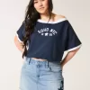 Low-Rise Medium Wash Star Applique Denim Mini Skort