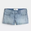 Low-Rise Medium Wash Studded Denim Shortie Shorts