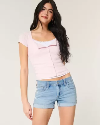 Low-Rise Ripped Light Wash Denim Shortie Shorts
