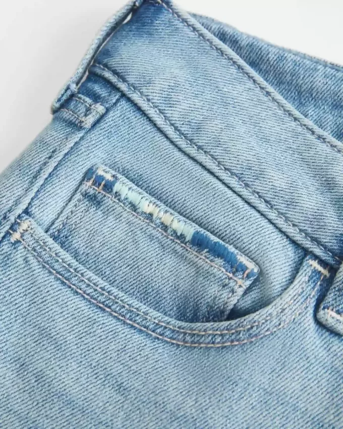 Low-Rise Ripped Light Wash Embroidered Bootcut Jeans