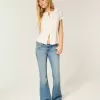 Ultra Low-Rise Medium Wash Flare Jeans