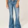Ultra Low-Rise Medium Wash Flare Jeans