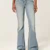 Ultra Low-Rise Medium Wash Flare Jeans