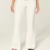 Ultra Low-Rise White Embroidered Pocket Flare Jeans Ultra Low-Rise White Embroidered Pocket Flare Jeans