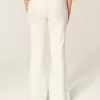 Ultra Low-Rise White Embroidered Pocket Flare Jeans Ultra Low-Rise White Embroidered Pocket Flare Jeans